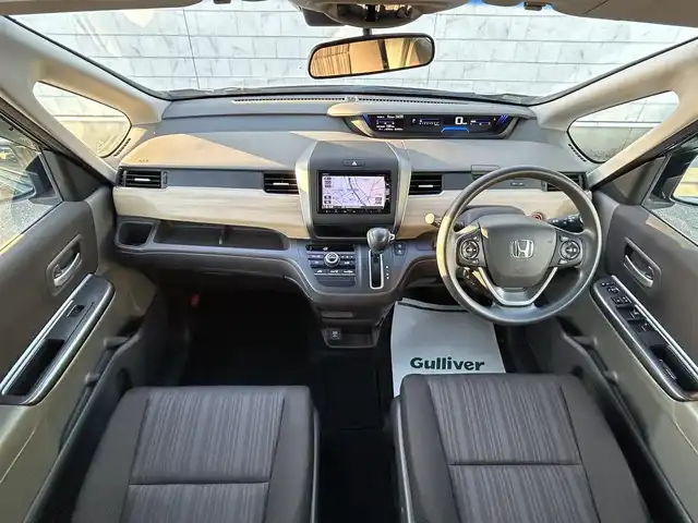 ホンダ フリード G ホンダセンシング 福岡県 2017(平29)年 6.5万km クリスタルブラックパール 純正７型SDナビ(フルセグTV/CD/DVD/BT)後席フリップダウンモニターバックカメラホンダセンシング両側電動レーダークルコンETC純正LEDヘッドライト純正フロアマットプッシュスタートスマートキー