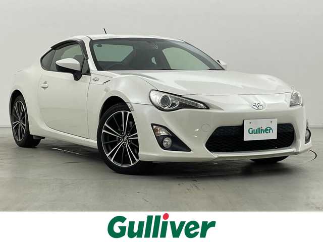 トヨタ ８６ GT 群馬県 2014(平26)年 6万km サテンホワイトパール 純正7インチナビ/(AM/FM/Bluetooth/フルセグTV/CD/DSVD)/LEDヘッドランプ(オートレベリング機能付)/パドルシフト/ETC/社外前後方ドライブレコーダー/リヤスポイラー/電動格納ミラー/純正17インチアルミホイール/プッシュスタート/スマートキー/スペアキー有