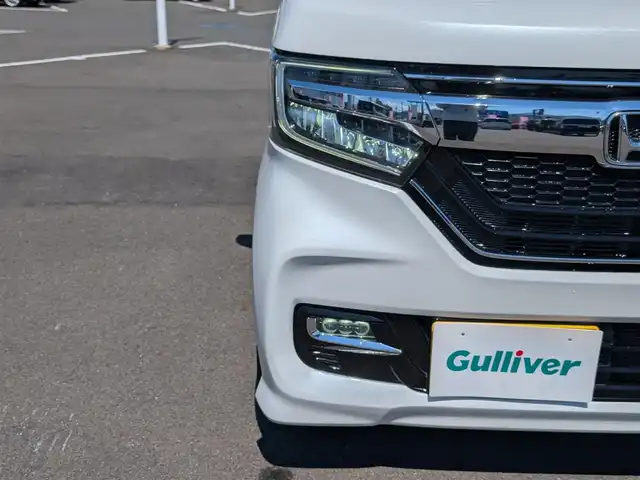 ホンダ Ｎ ＢＯＸ カスタム G L ホンダセンシング 福井県 2020(令2)年 2.5万km プラチナホワイトパール 社外7インチSDナビ【CN-RE06D】/FM AM/SD/iPod/USB/Bluetooth /CD DVD/フルセグテレビ/革巻きステアリング/ステアリングリモコン/LEDヘッドライト/オートライト/純正ビルトインETC/シートヒーター(D/N席)/ウィンカーミラー/ドアバイザー/フロアマット/プラズマクラスター装備エアコン/ホンダセンシング/レーダークルーズコントロール/レーンキープアシスト/車線はみ出し警報/横滑り防止装置/衝突被害軽減機能/標識認識機能