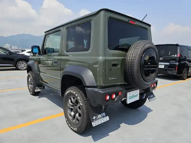 スズキ ジムニー シエラ JC 長野県 2021(令3)年 2.9万km ジャングルグリーン 〇純正8インチナビ/〇フルセグTV/〇バックカメラ/〇ビルトインETC/〇ワンオーナー車/〇JAOSフロントバンパー/〇JAOSリアバンパー/〇JAOSマッドガード/〇JAOSサイドスカート/〇JAOSショックアブソーバー/〇JAOSマフラー/〇純正背面タイヤ/〇ベージュレザー調シートカバー/〇LEDヘッドランプ/〇フロントフォグランプ/〇オートライト/〇純正15インチアルミホイール/〇デュアルセンサーブレーキサポート/〇誤発進抑制機能/〇車線逸脱抑制機能/〇ふらつき警報機能/〇標識認識機能/〇ハイビームアシスト/〇クルーズコントロール/〇革巻きステアリングホイール/〇ステアリングスイッチ/〇SRSエアバッグ/〇オートエアコン/〇シートヒーター/〇キーレスプッシュスタートシステム/〇禁煙車
