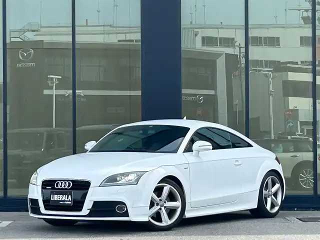 アウディ ＴＴクーペ 2．0 TFSI Sラインパック 石川県 2012(平24)年 6.3万km 白 純正SDナビ/Bluetooth・AM/FM・CD・DVD・ipod・USB・VTR/フルセグTV/ETC/クルーズコントロール/シートヒーター（D+N席）/パドルシフト/アンチロック・ブレーキ・システム/横滑り防止装置/盗難防止装置/エアバッグ（W+サイド）/純正フロアマット/純正アルミホイール/オートライト/スマートキー