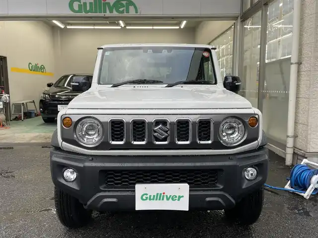 スズキ ジムニー ノマド FC 宮城県 2025(令7)年 0.1千km アークティックホワイトパール ワンオーナー/切替式4WD/コーナーセンサー/アイドリングストップ/ヘッドライトウォッシャー/ダウンヒルアシスト/レーダークルーズコントロール/衝突軽減システム/レーンキープアシスト/横滑り防止装置/前席シートヒーター/背面タイヤ/オートライト/電動格納ミラー/エンジンプッシュスタート/スマートキー/スペアキー/保証書/取り扱い説明書/純正AW付き夏タイヤ（195/80/R15）