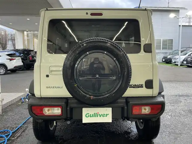 スズキ ジムニー ノマド FC 宮城県 2025(令7)年 0.1千km アークティックホワイトパール ワンオーナー/切替式4WD/コーナーセンサー/アイドリングストップ/ヘッドライトウォッシャー/ダウンヒルアシスト/レーダークルーズコントロール/衝突軽減システム/レーンキープアシスト/横滑り防止装置/前席シートヒーター/背面タイヤ/オートライト/電動格納ミラー/エンジンプッシュスタート/スマートキー/スペアキー/保証書/取り扱い説明書/純正AW付き夏タイヤ（195/80/R15）