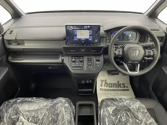 ホンダ ステップワゴン スパーダ eHEV 宮城県 2025(令7)年 0.1千km クリスタルブラックパール 登録済み未使用車/11型Honda CONNECTナビ/・BT接続/フルセグTV/・CD/DVD/・USB入力/AM/FM/15型フリップダウンモニター/安全装置/・衝突軽減ブレーキ/・踏み間違い衝突軽減システム/・ブラインドスポットモニター/・路外逸脱抑制機能/両側パワースライドドア/電動リアゲート/レーダークルーズコントロール/純正16インチAW/後列シートオットマン