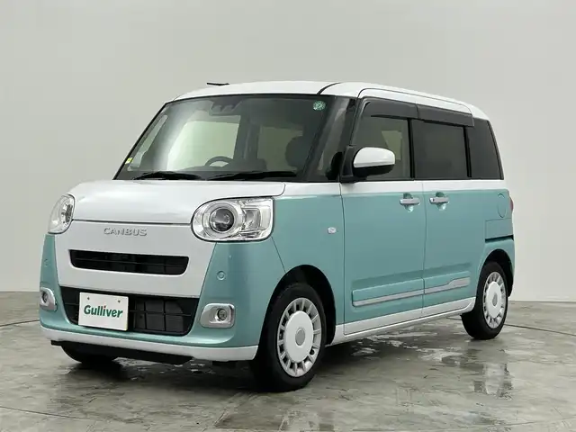 ダイハツ ムーヴ キャンバス ストライプス G 群馬県 2024(令6)年 0.1万km シャイニングホワイトパール/ファインミントメタリック 社外７型ナビ　全方位カメラ　衝突軽減　両側パワスラ　コーナーセンサー　シートヒーター　Ｂｌｕｅｔｏｏｔｈ　フルセグ　ＬＥＤ　オートライト　ステアリングスイッチ　プッシュスタート　スマートキー　禁煙車