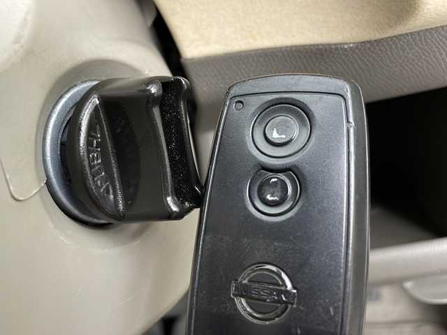 日産 モコ E FOUR 新潟県 2006(平18)年 8万km マルーンブラウンパール 4WD/純正CD/MD/スマートキー/運転席シートヒーター/オートエアコン/電動格納式ミラー/社外アルミ付きスタッドレス/　（積み込み４mm）