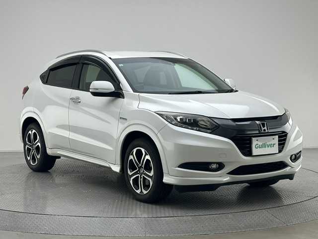 ホンダ ヴェゼル ハイブリッド Z 兵庫県 2015(平27)年 8万km ホワイトオーキッドパール 社外ナビ/(AVIC-RL09)/フルセグ CD DVD BT MSV/クルーズコントロール/CTBA/バックカメラ/ETC/ハーフレザーシート/シートヒーター/ルーフレール/LEDヘッドライト/オートライト/純正17インチアルミホイール/スマートキー/スペアキー