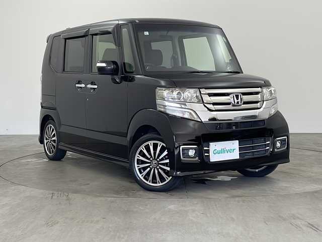 ホンダ Ｎ ＢＯＸ カスタム G ターボ Lパッケージ 兵庫県 2015(平27)年 1.8万km スマートブラック ・純正ナビ/CD/DVD/BT/フルセグTV/SD/・バックカメラ/・ETC/・スマートキー/・プッシュスタート/・両側パワースライドドア/・ハーフレザーシート/・クルーズコントロール/・純正アルミホイール/・純正マット/・リアサンシェード/・HIDヘッドライト/・フォグライト/・革巻きステアリング/・ステアリングスイッチ