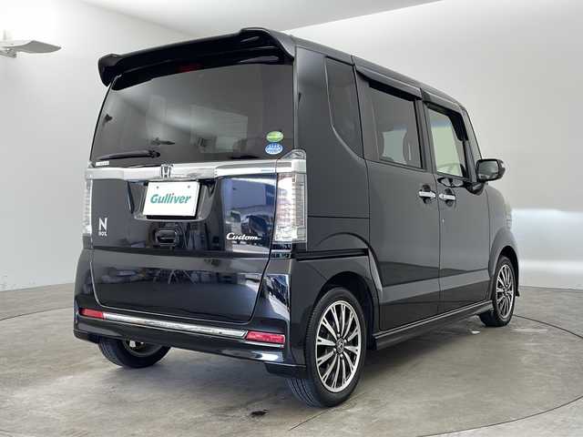 ホンダ Ｎ ＢＯＸ カスタム G ターボ Lパッケージ 兵庫県 2015(平27)年 1.8万km スマートブラック ・純正ナビ/CD/DVD/BT/フルセグTV/SD/・バックカメラ/・ETC/・スマートキー/・プッシュスタート/・両側パワースライドドア/・ハーフレザーシート/・クルーズコントロール/・純正アルミホイール/・純正マット/・リアサンシェード/・HIDヘッドライト/・フォグライト/・革巻きステアリング/・ステアリングスイッチ