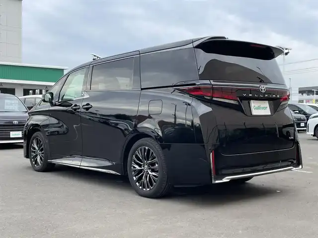 トヨタ ヴェルファイア ハイブリット Z プレミア 東京都 2024(令6)年 1.1万km ブラック ワンオーナー/純正14型DAナビ ＆フルセグ/・BluetoothAudio/HDMI/USB/・AppleCarPlay&AndroidAuto/OPサンセットブラウンレザーシート/・２列目エグゼクティブシート/・快適温熱シート/・前席パワーシート/アラウンドビューモニター/デジタルインナー /トヨタセーフティセンス /（予防安全パッケージ）/・プリクラシュセーフティ/・レーンチェンジアシスト/・全車速追従機能付き/レーダークルーズコントロール/・アダプティブハイビームアシスト/・ロードサインアシスト/トヨタチームメイト /・パーキングサポートブレーキ/・アドバンストドライブ/・アドバンストパーク/・リモート機能/予約機能付き両側パワースライドドア/パワーバックドア/３眼LEDヘッドライト/カラーヘッドアップディスプレィ/ビルトインETC２.０/保証書＆取説