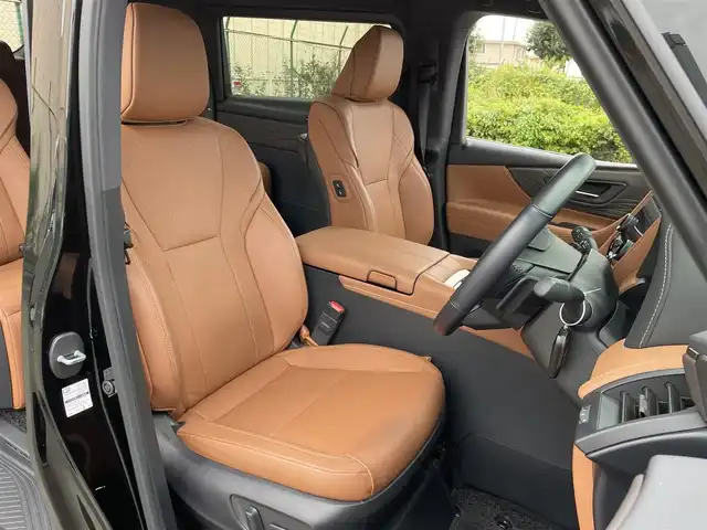 トヨタ ヴェルファイア ハイブリット Z プレミア 東京都 2024(令6)年 1.1万km ブラック ワンオーナー/純正14型DAナビ ＆フルセグ/・BluetoothAudio/HDMI/USB/・AppleCarPlay&AndroidAuto/OPサンセットブラウンレザーシート/・２列目エグゼクティブシート/・快適温熱シート/・前席パワーシート/アラウンドビューモニター/デジタルインナー /トヨタセーフティセンス /（予防安全パッケージ）/・プリクラシュセーフティ/・レーンチェンジアシスト/・全車速追従機能付き/レーダークルーズコントロール/・アダプティブハイビームアシスト/・ロードサインアシスト/トヨタチームメイト /・パーキングサポートブレーキ/・アドバンストドライブ/・アドバンストパーク/・リモート機能/予約機能付き両側パワースライドドア/パワーバックドア/３眼LEDヘッドライト/カラーヘッドアップディスプレィ/ビルトインETC２.０/保証書＆取説