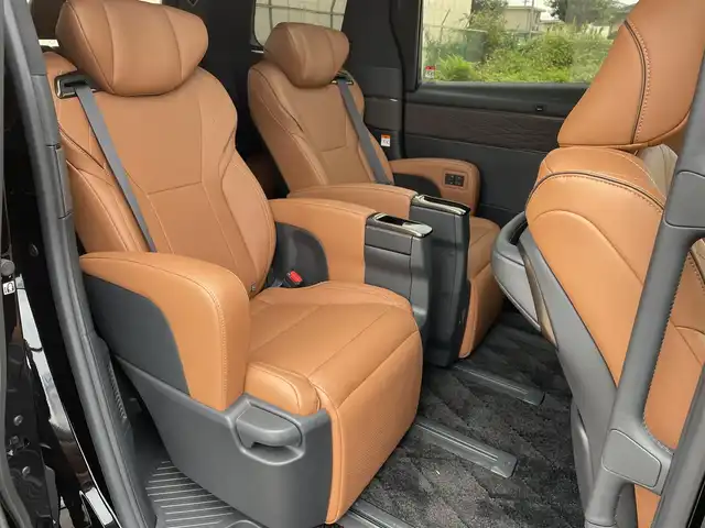 トヨタ ヴェルファイア ハイブリット Z プレミア 東京都 2024(令6)年 1.1万km ブラック ワンオーナー/純正14型DAナビ ＆フルセグ/・BluetoothAudio/HDMI/USB/・AppleCarPlay&AndroidAuto/OPサンセットブラウンレザーシート/・２列目エグゼクティブシート/・快適温熱シート/・前席パワーシート/アラウンドビューモニター/デジタルインナー /トヨタセーフティセンス /（予防安全パッケージ）/・プリクラシュセーフティ/・レーンチェンジアシスト/・全車速追従機能付き/レーダークルーズコントロール/・アダプティブハイビームアシスト/・ロードサインアシスト/トヨタチームメイト /・パーキングサポートブレーキ/・アドバンストドライブ/・アドバンストパーク/・リモート機能/予約機能付き両側パワースライドドア/パワーバックドア/３眼LEDヘッドライト/カラーヘッドアップディスプレィ/ビルトインETC２.０/保証書＆取説