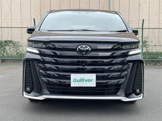 トヨタ ヴェルファイア ハイブリット Z プレミア 東京都 2024(令6)年 1.1万km ブラック ワンオーナー/純正14型DAナビ ＆フルセグ/・BluetoothAudio/HDMI/USB/・AppleCarPlay&AndroidAuto/OPサンセットブラウンレザーシート/・２列目エグゼクティブシート/・快適温熱シート/・前席パワーシート/アラウンドビューモニター/デジタルインナー /トヨタセーフティセンス /（予防安全パッケージ）/・プリクラシュセーフティ/・レーンチェンジアシスト/・全車速追従機能付き/レーダークルーズコントロール/・アダプティブハイビームアシスト/・ロードサインアシスト/トヨタチームメイト /・パーキングサポートブレーキ/・アドバンストドライブ/・アドバンストパーク/・リモート機能/予約機能付き両側パワースライドドア/パワーバックドア/３眼LEDヘッドライト/カラーヘッドアップディスプレィ/ビルトインETC２.０/保証書＆取説