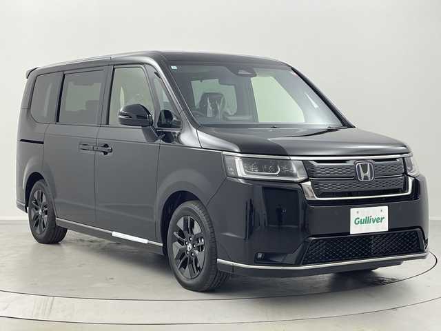 ホンダ ステップワゴン スパーダ eHEV 福島県 2025(令7)年 0.1千km クリスタルブラックパール /登録済未使用車//Honda SENSING/・衝突軽減ブレーキ/・路外逸脱抑制機能/・アダプティブクルーズコントロール/・車線維持支援システム//純正11.4インチナビ/・BT.CD.DVD.USB.スマホ連携.HDMI/・フルセグTV//バックカメラ//両側パワースライドドア//電動リアゲート//ハーフレザーシート/・前席シートヒーター/・オットマン//パドルシフト/・ステアリングスイッチ//LEDヘッドライト//プッシュスタート//スマートキー×2//電動パーキングブレーキ//純正16インチAW