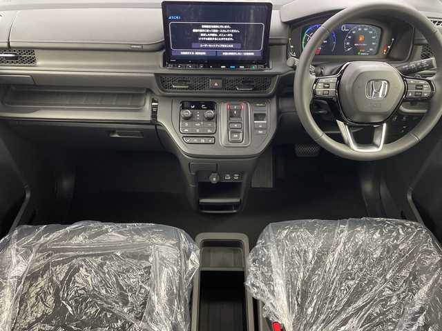 ホンダ ステップワゴン スパーダ eHEV 福島県 2025(令7)年 0.1千km クリスタルブラックパール /登録済未使用車//Honda SENSING/・衝突軽減ブレーキ/・路外逸脱抑制機能/・アダプティブクルーズコントロール/・車線維持支援システム//純正11.4インチナビ/・BT.CD.DVD.USB.スマホ連携.HDMI/・フルセグTV//バックカメラ//両側パワースライドドア//電動リアゲート//ハーフレザーシート/・前席シートヒーター/・オットマン//パドルシフト/・ステアリングスイッチ//LEDヘッドライト//プッシュスタート//スマートキー×2//電動パーキングブレーキ//純正16インチAW