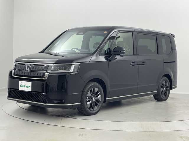 ホンダ ステップワゴン スパーダ eHEV 福島県 2025(令7)年 0.1千km クリスタルブラックパール /登録済未使用車//Honda SENSING/・衝突軽減ブレーキ/・路外逸脱抑制機能/・アダプティブクルーズコントロール/・車線維持支援システム//純正11.4インチナビ/・BT.CD.DVD.USB.スマホ連携.HDMI/・フルセグTV//バックカメラ//両側パワースライドドア//電動リアゲート//ハーフレザーシート/・前席シートヒーター/・オットマン//パドルシフト/・ステアリングスイッチ//LEDヘッドライト//プッシュスタート//スマートキー×2//電動パーキングブレーキ//純正16インチAW