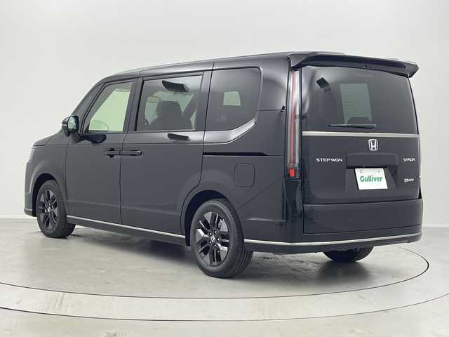 ホンダ ステップワゴン スパーダ eHEV 福島県 2025(令7)年 0.1千km クリスタルブラックパール /登録済未使用車//Honda SENSING/・衝突軽減ブレーキ/・路外逸脱抑制機能/・アダプティブクルーズコントロール/・車線維持支援システム//純正11.4インチナビ/・BT.CD.DVD.USB.スマホ連携.HDMI/・フルセグTV//バックカメラ//両側パワースライドドア//電動リアゲート//ハーフレザーシート/・前席シートヒーター/・オットマン//パドルシフト/・ステアリングスイッチ//LEDヘッドライト//プッシュスタート//スマートキー×2//電動パーキングブレーキ//純正16インチAW