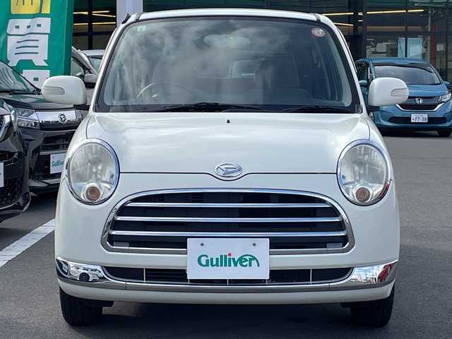 ダイハツ ミラ ジーノ X 長野県 2005(平17)年 5.5万km ホワイトパールマイカ 禁煙車/純正オーディオ（CD/MD/FM/AM）/電動格納ミラー/リモコンキー/純正フロアマット/純正ドアバイザー/社外13インチAW