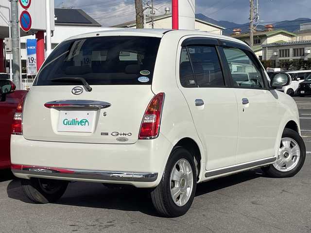 ダイハツ ミラ ジーノ X 長野県 2005(平17)年 5.5万km ホワイトパールマイカ 禁煙車/純正オーディオ（CD/MD/FM/AM）/電動格納ミラー/リモコンキー/純正フロアマット/純正ドアバイザー/社外13インチAW