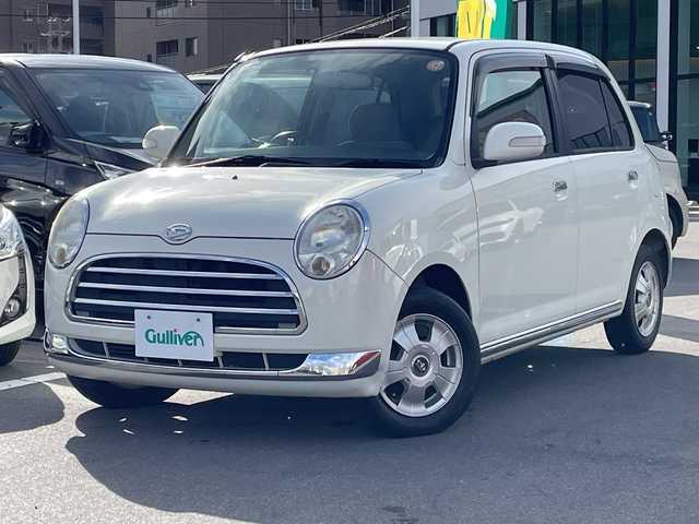 ダイハツ ミラ ジーノ X 長野県 2005(平17)年 5.5万km ホワイトパールマイカ 禁煙車/純正オーディオ（CD/MD/FM/AM）/電動格納ミラー/リモコンキー/純正フロアマット/純正ドアバイザー/社外13インチAW