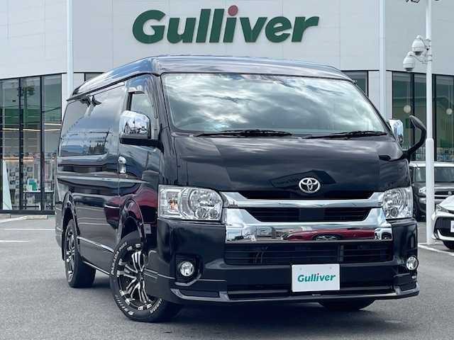 トヨタ ハイエース GL ロング 長崎県 2022(令4)年 1.9万km ブラックマイカ ワンオーナー/カロッツェリア後席モニター/モデリスタエアロ/社外ナビ/（BD/DVD/CD/SD/フルセグ）/バックカメラ/プリクラッシュセーフティシステム/レーンキープアシスト/AC100V/オートライト/純正タイヤ積込/ドライブレコーダー/スマートキー/革調シートカバー/純正フロアマット/クリアランスソナー/新車保証書/取扱説明書
