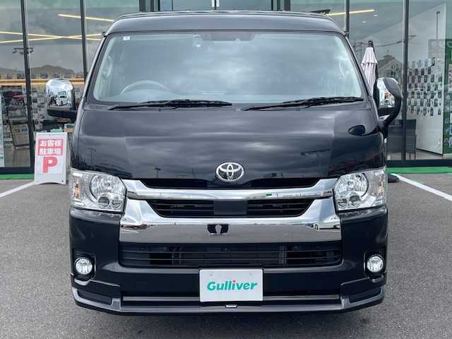 トヨタ ハイエース GL ロング 長崎県 2022(令4)年 1.9万km ブラックマイカ ワンオーナー/カロッツェリア後席モニター/モデリスタエアロ/社外ナビ/（BD/DVD/CD/SD/フルセグ）/バックカメラ/プリクラッシュセーフティシステム/レーンキープアシスト/AC100V/オートライト/純正タイヤ積込/ドライブレコーダー/スマートキー/革調シートカバー/純正フロアマット/クリアランスソナー/新車保証書/取扱説明書