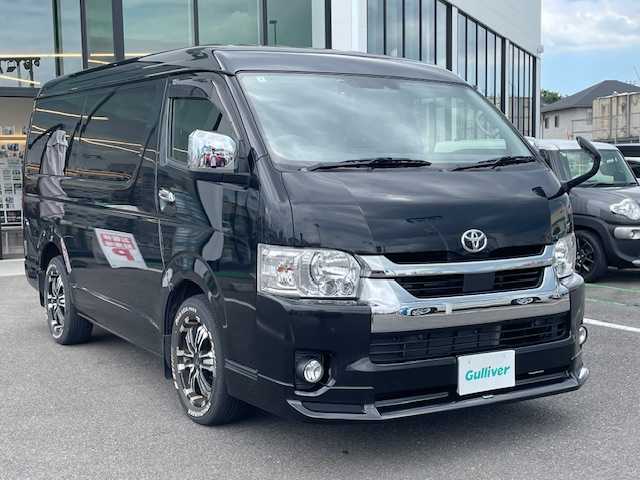 トヨタ ハイエース GL ロング 長崎県 2022(令4)年 1.9万km ブラックマイカ ワンオーナー/カロッツェリア後席モニター/モデリスタエアロ/社外ナビ/（BD/DVD/CD/SD/フルセグ）/バックカメラ/プリクラッシュセーフティシステム/レーンキープアシスト/AC100V/オートライト/純正タイヤ積込/ドライブレコーダー/スマートキー/革調シートカバー/純正フロアマット/クリアランスソナー/新車保証書/取扱説明書