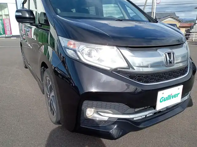 ホンダ ステップワゴン スパーダ ホンダセンシング 福井県 2016(平28)年 8.3万km プレミアムスパークルブラックパール 衝突被害軽減システム/純正9インチナビ（VXM-175VFNi）/・（フルセグTV/CD/DVD/Bluetooth/HDMI）/バックカメラ/ドライブレコーダー/パドルシフト/両側パワースライドドア/オートLEDライト/電動格納ウィンカーミラー/冬用スタッドレスタイヤ積込/純正16インチAW/純正フロアマット/スマートキー
