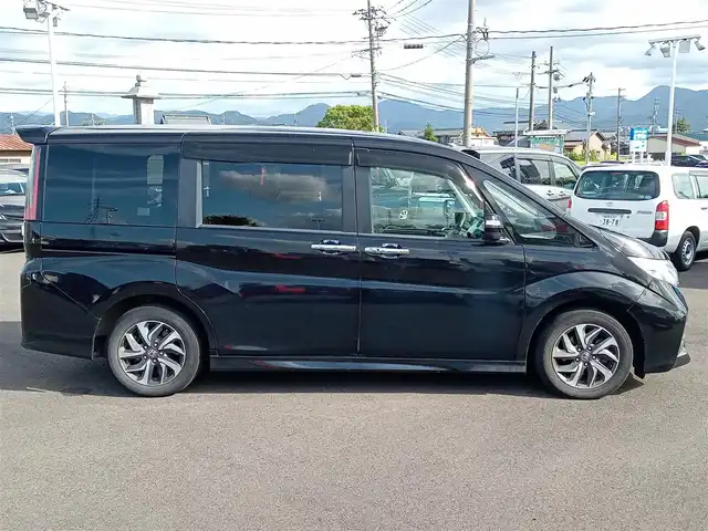 ホンダ ステップワゴン スパーダ ホンダセンシング 福井県 2016(平28)年 8.3万km プレミアムスパークルブラックパール 衝突被害軽減システム/純正9インチナビ（VXM-175VFNi）/・（フルセグTV/CD/DVD/Bluetooth/HDMI）/バックカメラ/ドライブレコーダー/パドルシフト/両側パワースライドドア/オートLEDライト/電動格納ウィンカーミラー/冬用スタッドレスタイヤ積込/純正16インチAW/純正フロアマット/スマートキー