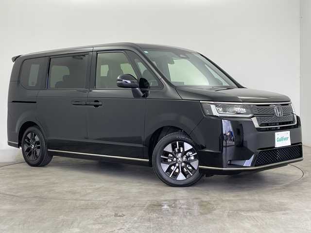 ホンダ ステップワゴン スパーダ eHEV 群馬県 2025(令7)年 0.1千km クリスタルブラックパール 禁煙車　登録済未使用車　純正１７．５インチナビ　バックカメラ　両側パワースライドドア　パワーバックドア　アダプティブクルーズコントロール　ＬＥＤライト　ＡＨＢ　純正16インチアルミホイール　スペアキー