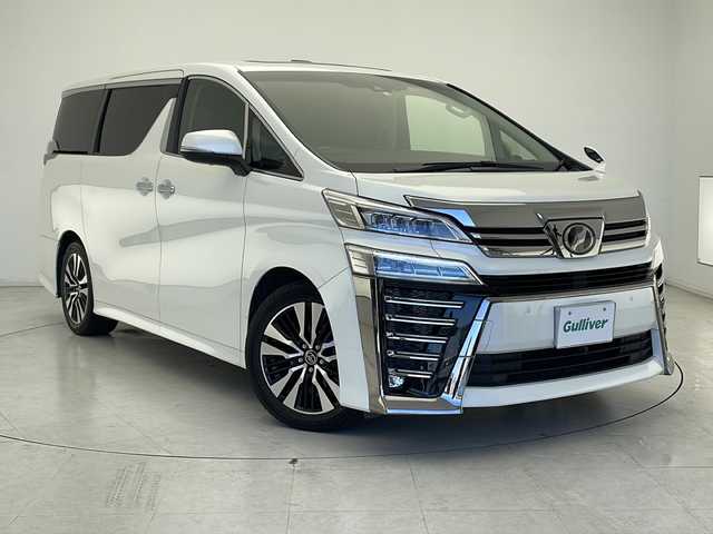 トヨタ ヴェルファイア Z Gエディション 千葉県 2019(平31)年 5.9万km ホワイトパールクリスタルシャイン トヨタセーフティセンス/　衝突被害軽減システム/レーンキープアシスト/　クリアランスソナー（前後）/パーキングブレーキ/　ブラインドスポットモニター/レーダークルーズコントロール/　オートハイビーム/LEDヘッドライト/サンルーフ/フリップダウンモニター/純正10インチSDナビ/　（Bluetooth/CD/DVD/フルセグTV/USB）/HDMI/バックカメラ/純正ビルトインETC2.0/デジタルインナーミラー/両側パワースライドドア/パワーシート（D/N席）/シートヒーター（2列目D/N席）/エアシート（2列目D/N席）/MTモード付AT/社外フロアマット/純正18インチアルミホイール