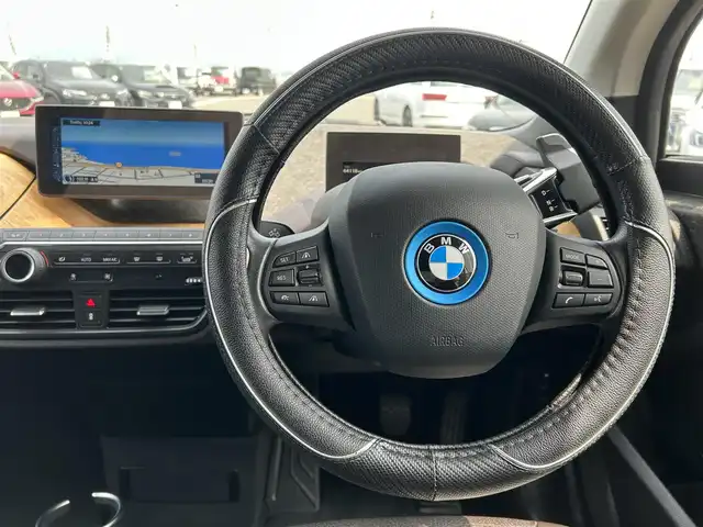 ＢＭＷ ｉ３ レンジエクステンダー 島根県 2016(平28)年 6.5万km 白 純正ナビ/(AM/FM/USB/Bluetooth)/ブラウンレザーシート/バックカメラ/インテリジェントセーフティ/アダクティブクルーズコントロール/D/N席シートヒーター/ドライブレコーダー/LEDヘッドライト/オートライト/社外AW付スタッドレス車載/スマートキー/スペアキー/プッシュスタート/ミラー内蔵型ETC/純正フロアマット/充電ケーブルあり/保証書/取扱説明書