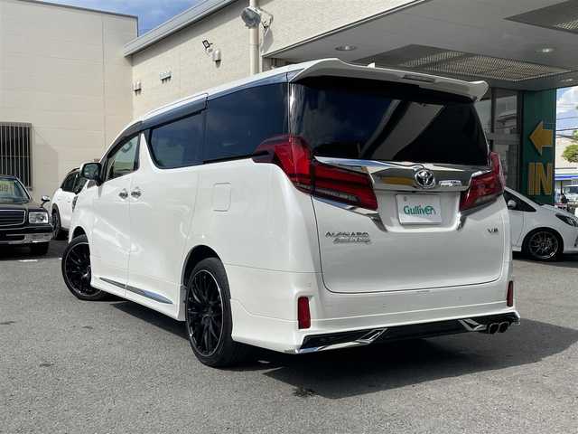 トヨタ アルファード エグゼクティブ ラウンジ S 和歌山県 2018(平30)年 7.3万km ホワイトパールクリスタルシャイン モデリスタフルエアロ/JBLサウンド/純正ナビ（AM/FM.ワンセグフルセグTV.BLUETOOTH.USB.AUX)/後席フリップダウンモニター/D/N席パワーシート/シートメモリ/助手席パワーオットマン/後席電動リクライニングシート/クルーズコントロール/サンルーフ/デジタルインナーミラー/両側パワースライドドア/電動リアゲート/前後ドライブレコーダー/全周囲カメラ/ETC2.0/フォグランプ/BSM/スペアタイヤ/車内ライト/読書灯/置くだけ充電器/リアクロストラフィックアラート/ロードサインアシスト/スマートキー/スペアキー