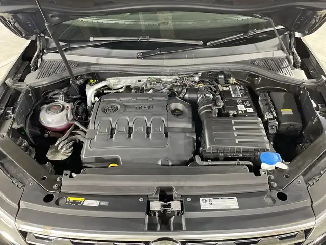 フォルクスワーゲン ティグアン TDI 4モーション ハイライン 福岡県 2018(平30)年 1.3万km 紺 メーカー純正メモリナビ/全方位カメラ/ワンセグ/レーダークルーズコントロール/自動パーキング/電動吏アゲート/ヘッドアップディスプレイ/コーナーセンサー/CD/DVD/AM/FM/USB/Bluetooth/スマートキー/シートヒーター(D/N)/前ドラレコ/ブラインドスポットモニター/ETC2.0/横滑り防止装置/純正アルミホイール/純正フロアマット/レーンキープアシスト/パドルシフト