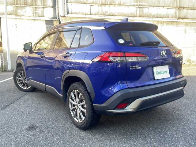 トヨタ カローラ クロス ハイブリッド Z 愛知県 2022(令4)年 3.1万km ダークブルーマイカM ワンオーナー/パノラマルーフ/８インチディスプレイオーディオ＋ナビ/ルーフレール/パワーバックドア/前席シートヒーター/運転席パワーシート/ハーフレザーシート/トヨタセーフティーセンス/・プリクラッシュセーフティ/・レーダークルーズコントロール/・レーントレーシングアシスト/・ロードサインアシスト/・オートハイビーム/・プロアクティブドライビングアシスト/・パーキングサポートブレーキ/クリアランスソナー/ブラインドスポットモニター/LEDヘッドライト/フォグライト/オートライト/前後ドライブレコーダー（DC-DR652）/ETC/純正フロアマット/純正ドアバイザー/2025年10月8日新品バッテリー交換/ディーラー整備記録簿R5 R6/取扱説明書/保証書/スペアスマートキー