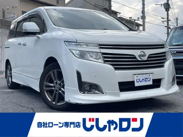 日産 エルグランド 250HWS アーバンクロム 福岡県 2012(平24)年 7.9万km ブリリアントホワイトパール (株)IDOMが運営する【じしゃロン八幡西店】の自社ローン専用車両になります。こちらは現金またはオートローンご利用時の価格です。自社ローンご希望の方は別途その旨お申付け下さい/・純正ナビ/・バックカメラ/・Bluetooth/・DVD再生可/・フリップダウンモニター/・両側パワースライドドア/・プッシュスタート/・純正18インチホイール