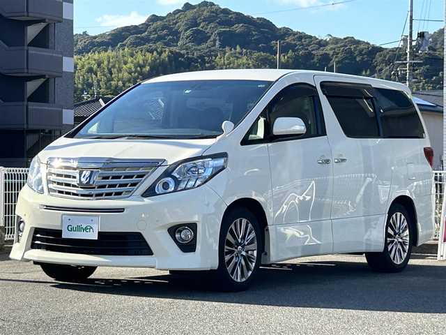 トヨタ アルファード 240S タイプゴールド 山口県 2013(平25)年 7.6万km ゴールドパールクリスタルシャイン アルパイン BIGX 9型SDナビ/フルセグTV CD DVD BT/アルパイン フリップダウンモニター/バックカメラ/両側パワースライドドア/パワーバックドア/クルーズコントロール/ビルトイン ETC/コーナーセンサー/ウッドコンビ ステアリング/ステアリングリモコン/ハーフレザーシート/HIDオートヘッドライト/フォグライト/スマートキー 2個/W サイド カーテン エアバッグ