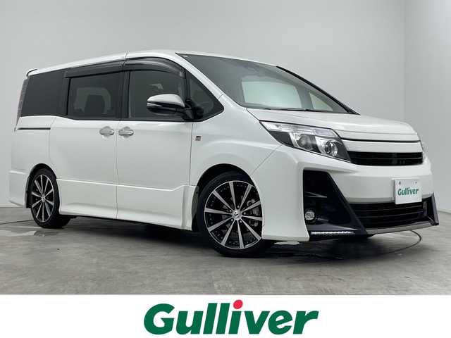 トヨタ ノア Si GRスポーツ 三重県 2019(平31)年 1.2万km ホワイトパールクリスタルシャイン ワンオーナー/セーフティセンス/・プリクラッシュセーフティ/・レーンディパーチャーアラート/・オートマチックハイビーム/・先行車発進告知/クルーズコントロール/アルパイン９型ナビ（X9Z）/・フルセグTV/・CD/DVD/・Bluetooth/・SD/音楽録音/バックカメラ/アルパイン10.1型フリップダウンモニター/ハーフレザーシート/革巻きステアリング/ステアリングスイッチ/LED室内灯/前後ドライブレコーダー（ケンウッド）/ビルトインETC/ドアバイザー/クラッツィオフロアマット/VANESSA18インチホイール215/４５R18/純正18インチアルミホイール（スタッドレス）４本車載/225/４５R18/純正サスペンション車載