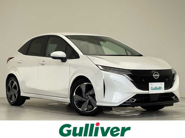 日産 オーラ G 愛知県 2022(令4)年 1.7万km ピュアホワイトパール 7型ナビ/三眼LEDヘッドライト/全方位カメラ/CD/Bluetooth/コーナーセンサー/純正アルミホイール/ブラインドスポットモニター/インテリジェントミラー/衝突軽減システム/オートマチックハイビーム/ドライブレコーダー/ETC/ステアリングスイッチ/スマートキー/プッシュスタート