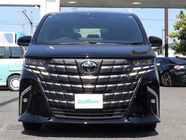 トヨタ アルファードハイブリット Z 神奈川県 2025(令7)年 0.1千km ブラック ワンオーナー/TOYOTAチームメイト/ムーンルーフ/ユニバーサルステップ/パーキングサポートブレーキ(後方歩行者)/床下透過表示機能付パラノミックビューモニター/バックカメラ洗浄機能/自動防眩インナーミラー/ステアリングヒーター/排気ガス検知式フルオートエアコン/マイコンプリセットドライビングポジションシステム/助手席肩口パワーシートスイッチ/2列目エグゼクティブシート/14インチディスプレイオーディオ/10スピーカー/JBLサウンドスピーカー/アドバンストパーク/パーキングサポートシステム/アドバントドライブ/フロントクロストラフィックアラート/レーンチェンジアシスト/ドライバーモニターカメラ/パドルシフト/エレクトロシフトマチック/保証書/スペアスマートキー/純正メモリナビ/フルセグテレビ/アラウンドビューモニター/ウィンカーミラー/オットマン/アダクティブアクティブクルーズコントロール/ドアバイザー/プッシュスタート/両側パワースライドドア/パワーバックドア/ETC2.0/デジタルインナーミラー/置くだけ充電/100V電源