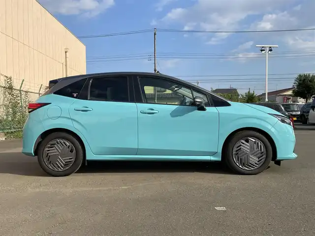 日産 ノート X 東京都 2024(令6)年 0.9万km 青Ⅱ 純正ナビ（MM223D-Le）/プロパイロット/Bluetooth/フルセグ/全方位カメラ/ドライブレコーダー/前後コーナーセンサー/オートライト/オートマチックハイビーム/デジタルインナーミラー/ターコイズ/ダークメタルグレー2トーン