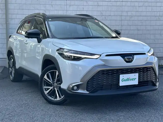 トヨタ カローラ クロス ハイブリッド Z 大分県 2024(令6)年 0.6万km アティチュードブラックマイカ/プラチナホワイトパールマイカ 〇ワンオーナー/〇純正ディスプレイオーディオナビ付/　ラジオ・BT・フルセグ/〇全方位カメラ/〇ハーフレザーシート/〇ガラスルーフ/〇ETC2.0/〇ステアリングスイッチ/〇革巻きステリング/〇ACC/〇BSM/〇LKA/〇ステアリングヒーター/〇オートハイビームアシスト/〇ヘッドライトレベライザー/〇パワーバックドア/〇シートヒーター/〇パーキングアシスト/〇置くだけ充電/〇運転席パワーシート/〇純正フォグランプ/〇純正バックフォグ/〇保証書/〇取扱説明書/〇スペアキー