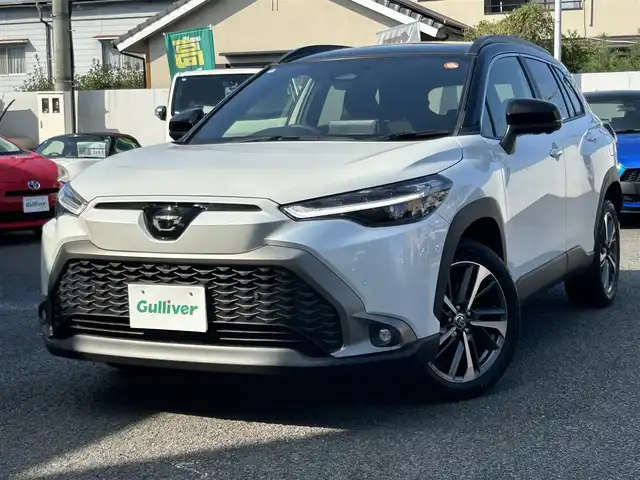 トヨタ カローラ クロス ハイブリッド Z 大分県 2024(令6)年 0.6万km アティチュードブラックマイカ/プラチナホワイトパールマイカ 〇ワンオーナー/〇純正ディスプレイオーディオナビ付/　ラジオ・BT・フルセグ/〇全方位カメラ/〇ハーフレザーシート/〇ガラスルーフ/〇ETC2.0/〇ステアリングスイッチ/〇革巻きステリング/〇ACC/〇BSM/〇LKA/〇ステアリングヒーター/〇オートハイビームアシスト/〇ヘッドライトレベライザー/〇パワーバックドア/〇シートヒーター/〇パーキングアシスト/〇置くだけ充電/〇運転席パワーシート/〇純正フォグランプ/〇純正バックフォグ/〇保証書/〇取扱説明書/〇スペアキー