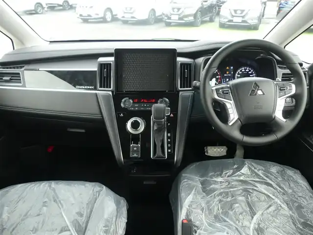 三菱 デリカＤ：５ シャモニー 千葉県 2025(令7)年 0.1千km 黒Ⅱ CHAMONIX (8人)　4WD　e-Assist/オリジナルナビ取付パッケージ＋リアモニター取付パッケージ(25/300)　ステップレス　（8人）/e-Assist/オリジナルナビ取付パッケージ＋リアモニター取付パッケージ(25/300)　ステップレス　（8人）/e-Assist/・衝突被害軽減ブレーキシステム（FCM）/・車線逸脱警報システム（LDW）/・誤発進抑制機能（前進＆後退時）（UMS）/・レーダークルーズコントロールシステム（ACC）/・オートマチックハイビーム[AHB]/エレクトリックテールゲート/両側パワースライドドア/マルチアラウンドモニター/運転席パワーシート/前席シートヒーター/ハーフレザーシート/革巻きステアリング/ステアリングスイッチ/ステアリングヒーター/パドルシフト/LEDヘッドライト/フォグライト/ウインカーミラー/純正18インチアルミホイル/サイド/カーテンエアバッグ/スマートキー