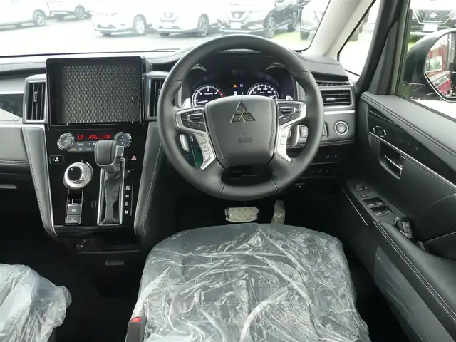 三菱 デリカＤ：５ シャモニー 千葉県 2025(令7)年 0.1千km 黒Ⅱ CHAMONIX (8人)　4WD　e-Assist/オリジナルナビ取付パッケージ＋リアモニター取付パッケージ(25/300)　ステップレス　（8人）/e-Assist/オリジナルナビ取付パッケージ＋リアモニター取付パッケージ(25/300)　ステップレス　（8人）/e-Assist/・衝突被害軽減ブレーキシステム（FCM）/・車線逸脱警報システム（LDW）/・誤発進抑制機能（前進＆後退時）（UMS）/・レーダークルーズコントロールシステム（ACC）/・オートマチックハイビーム[AHB]/エレクトリックテールゲート/両側パワースライドドア/マルチアラウンドモニター/運転席パワーシート/前席シートヒーター/ハーフレザーシート/革巻きステアリング/ステアリングスイッチ/ステアリングヒーター/パドルシフト/LEDヘッドライト/フォグライト/ウインカーミラー/純正18インチアルミホイル/サイド/カーテンエアバッグ/スマートキー