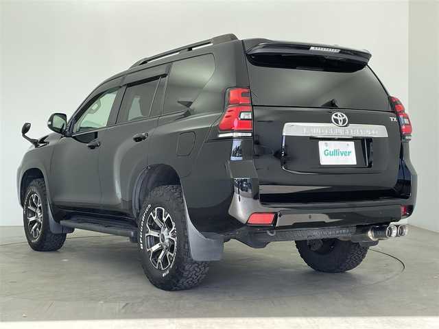 トヨタ ランドクルーザー プラド TX 大分県 2019(平31)年 6.1万km ブラック 社外９型ナビ　X9NX/(CD/DVD/SD/BT/HDMI/フルセグ)/バックカメラ/ＥＴＣ/Toyota Safety Sense/・プリクラッシュセーフティ（歩行者［昼］検知機能付衝突回避支援タイプ/ミリ波レーダー＋単眼カメラ方式）/・レーンディパーチャーアラート/・オートマチックハイビーム/・レーダークルーズコントロール（ブレーキ制御付）/コーナーセンサー/オートマチックハイビーム/レーダー探知機 GWT97ｓｄ/ドライブレコーダー前後/スマートキー2本/電動格納ウィンカーミラー/フォグランプ/全席シートカバー/ステアリングリモコン