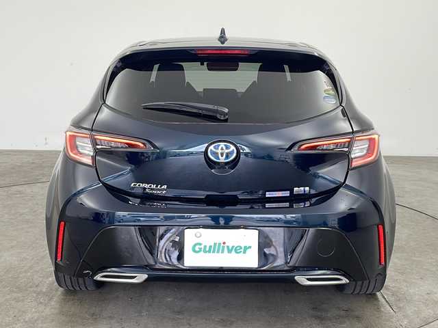トヨタ カローラ スポーツ ハイブリッドG Z 兵庫県 2018(平30)年 6.1万km ブラッキッシュアゲハガラスフレーク ・純正9インチナビ（フルセグ・DVD・CD・USB・BT）/・レーダークルーズコントロール/・プリクラッシュセーフティ/・レーンキープアシスト/・レーンディパチャ―アラート/・オートマチックハイビーム/・先行車発進通知/・クリアナンスソナー/・BSM/・HUD/・前後誤発進抑制機能/・標識認識機能/・バックカメラ/・社外フロントカメラ/・純正ドライブレコーダー（前方＋室内）/・ビルトインETC/・純正18インチアルミホイール/・LEDオートライト/・社外レーダー探知機/・純正フロアマット/・W＋サイドエアバック/・カーテンエアバック/・スマートキー/・プッシュスタート