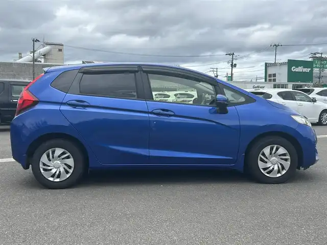 ホンダ フィット 13G Lパッケージ 山形県 2015(平27)年 7万km ブリリアントスポーティブルーメタリック2トーン 衝突被害軽減システム/純正SDナビ/　　　【CD DVD BT フルセグ USB AUX】/バックカメラ/LEDオートヘッドライト/ドライブレコーダー/アイドリングストップ/電動格納ウィンカーミラー/フォグランプ/ドアバイザ―/純正フロアマット/スマートキー×2/ETC