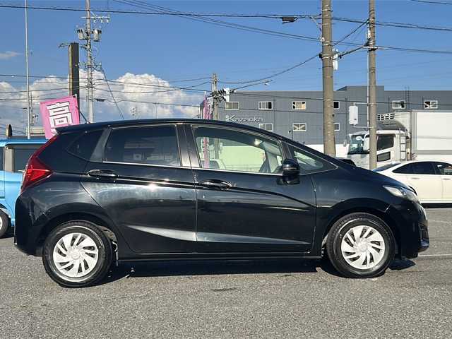 ホンダ フィット 13G Lパッケージ 愛知県 2014(平26)年 1.2万km クリスタルブラックパール /禁煙/ワンオーナー//ナビ/地デジ/CD/DVD/USB/MSV//アイドリングストップ//横滑り防止機能//ECONモード//プッシュスタート/スマートキー//純正フロアマット//電動格納ウィンカーミラー//LEDオートライト//保証書//取説//ナビ取説//スペアスマートキー有