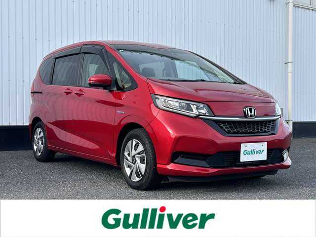 ホンダ フリード ハイブリット G ホンダセンシング 千葉県 2020(令2)年 1.3万km プレミアムクリスタルレッドM 社外8インチナビ/(フルセグTV BT AM FM CD DVD)/バックカメラ/衝突被害軽減システム/車線逸脱警報/クルーズコントロール/両側パワースライドドア/横滑り防止装置/ETC/ドライブレコーダー/アイドリングストップ/LEDヘッドライト/オートライト/ウィンカーミラー/電動格納ミラー/シートヒーター/シートリフター/プッシュスタート/スマートキー/フロアマット/ドアバイザー/スペアキー/取扱説明書/保証書